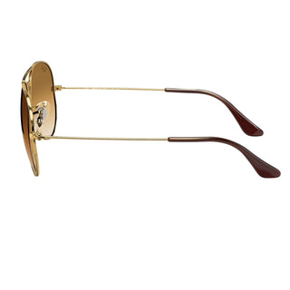 Ray-Ban Aviator Gradient sunglasses with gold frame and gradient lenses, offering timeless style and UV protection.
